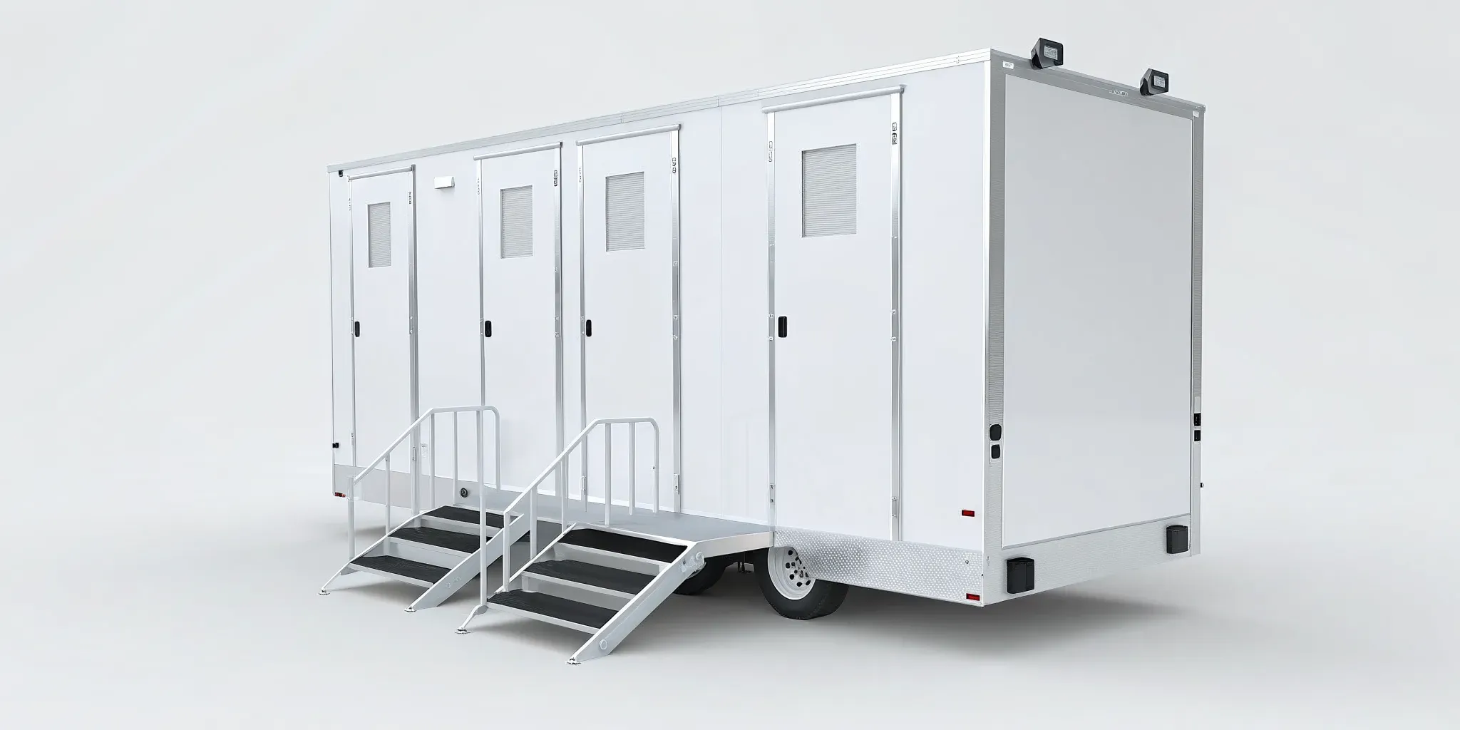 Upscale 4 stall restroom trailer rental with steps and four private entry doors.