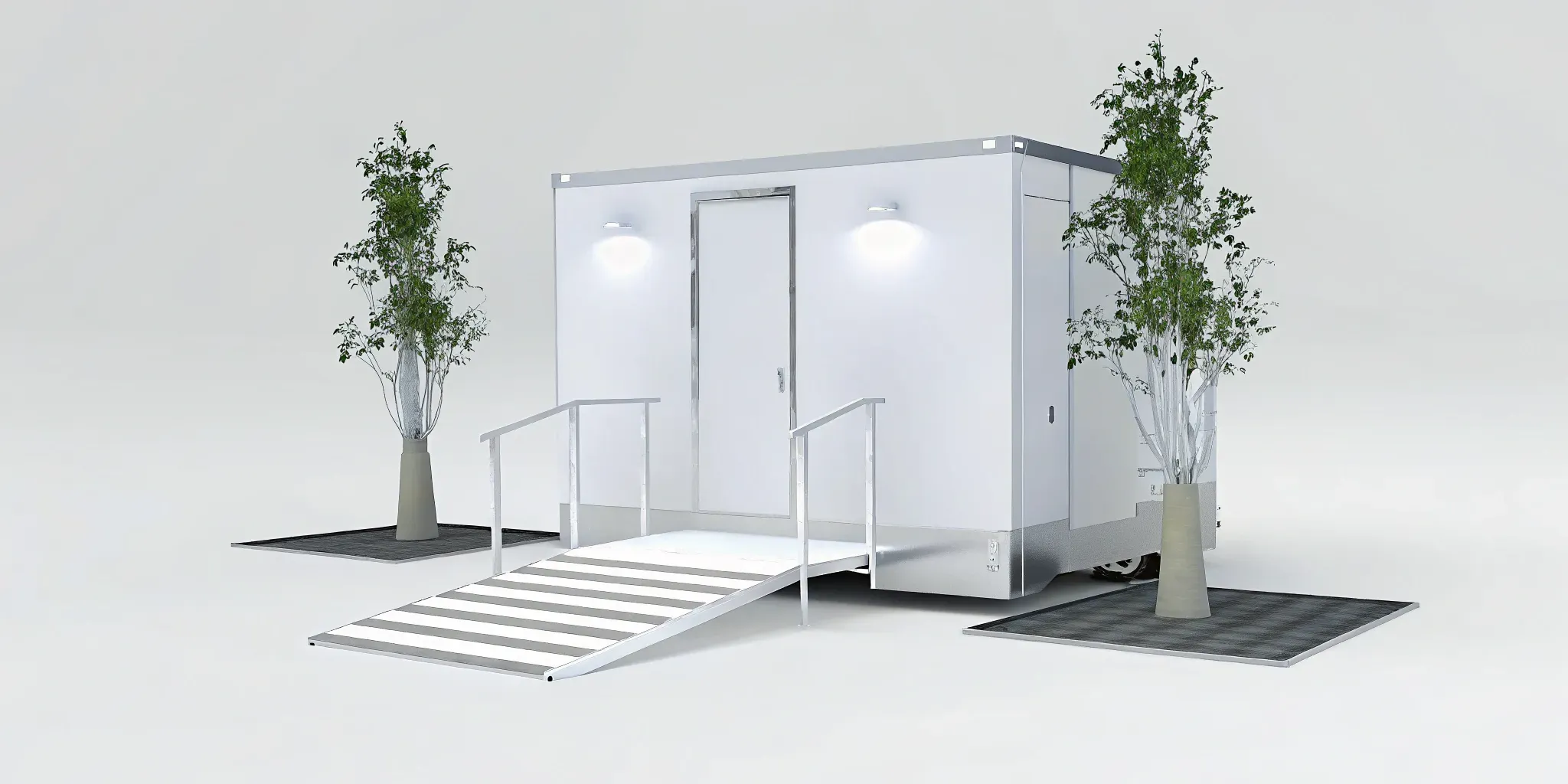 A luxury portable restroom trailer with AC and an ADA-accessible ramp available for event rental.