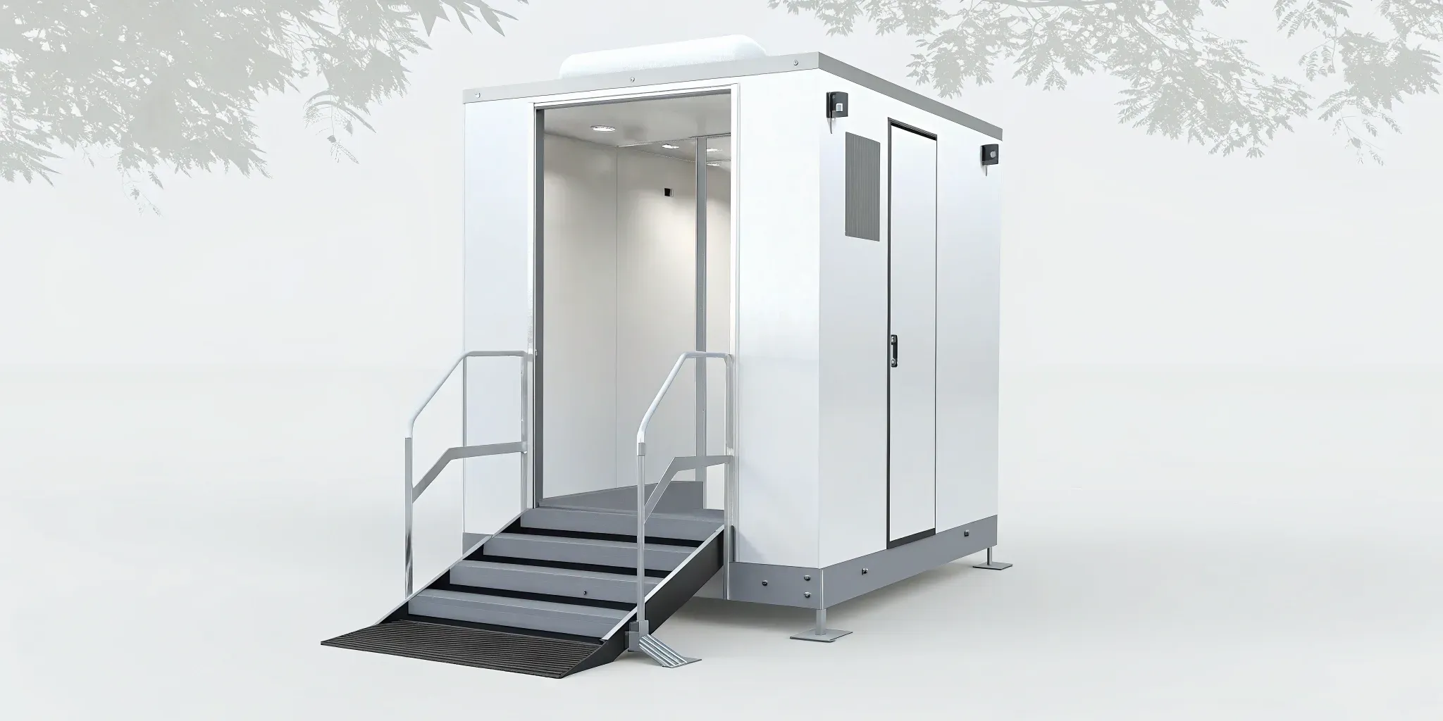 A portable toilet meeting ADA compliance with a wide, ramped entrance and a spacious interior for wheelchair users.